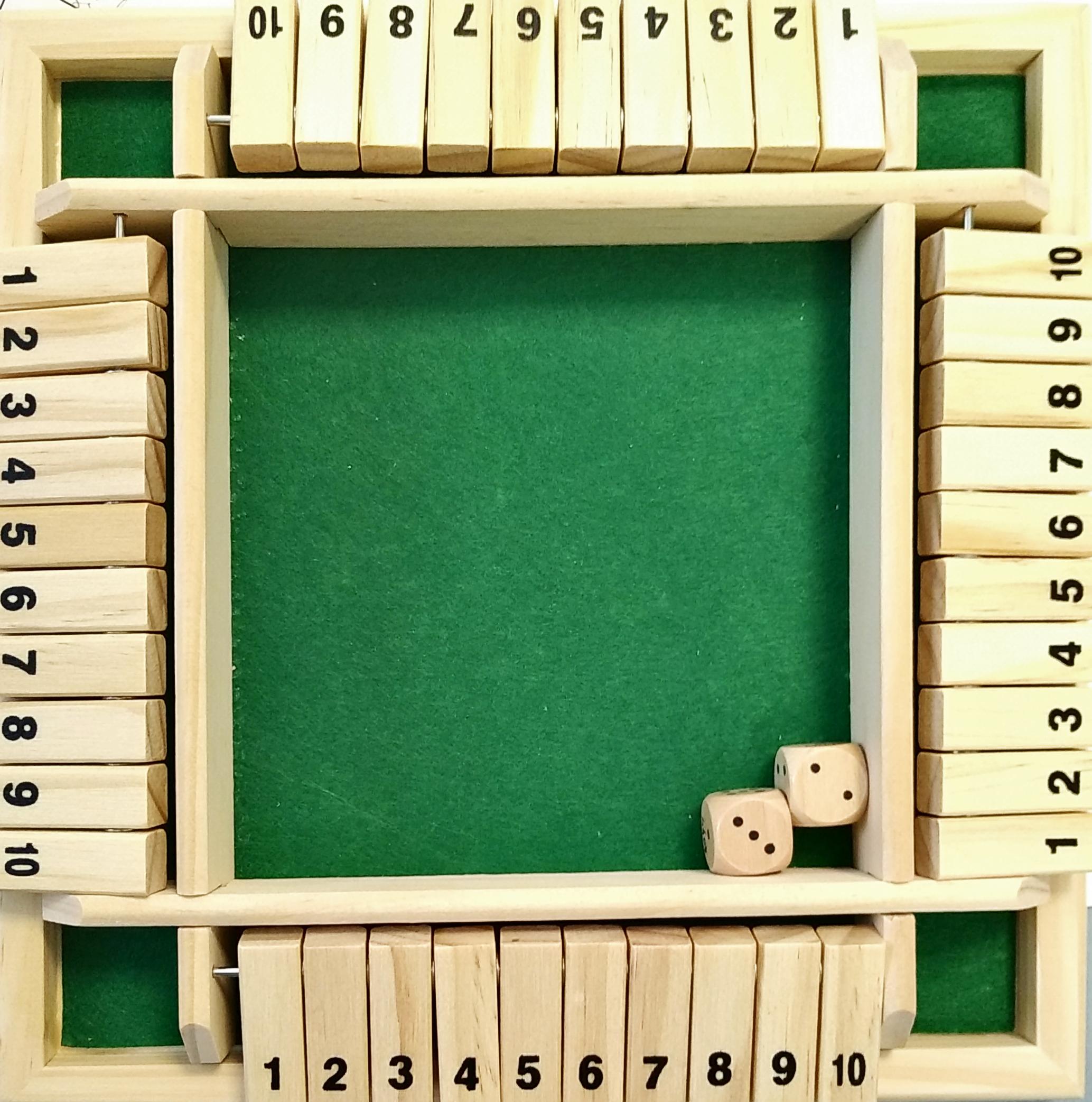 SHUT THE BOX<br>Référence ludothèque : 4404<br>2 à 4 joueur(s) <br>Un jeu de dés et de hasard où il faut lancer les dés et abaisser les planches numérotées en fonction des résultats obtenus. Pour 2 à 4 joueurs.